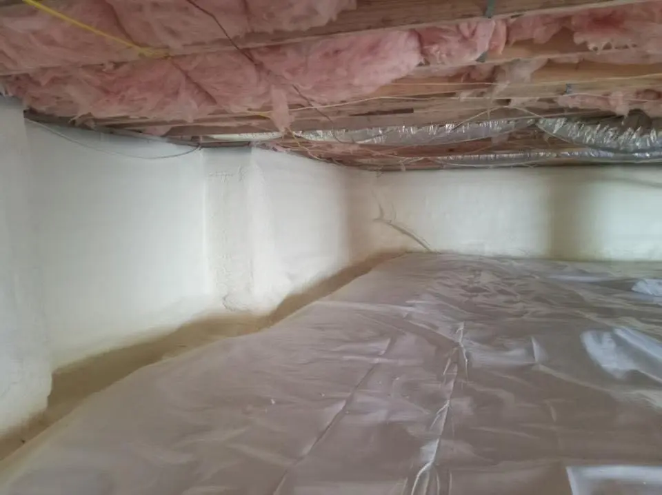 Crawl space encapsulation with closed-cell spray foam for Commercial Roof Restoration in Roseville